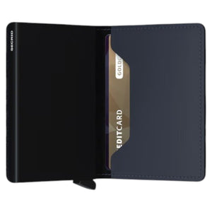 A SECRID - SLIMWALLET MATTE IN NIGHTBLUE is open, displaying euro banknotes and three credit cards neatly organized in RFID-protected slots, set against a white background.