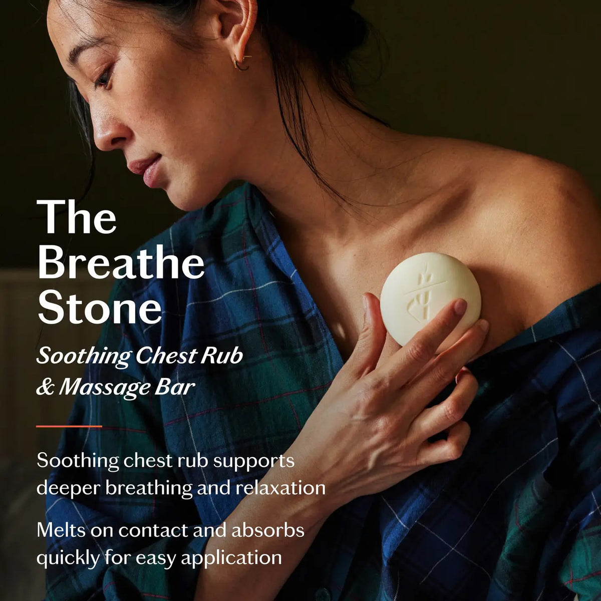 The KATE MCLEOD BREATHE STONE | SOOTHING CHEST RUB, a round white moisturizer stone with eucalyptus peppermint, is shown partially wrapped in cloth next to its green and orange box. A "LIMITED EDITION" red circle appears above on a pale yellow background.