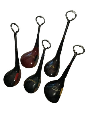 VINTAGE GOLF GIFTS' VINTAGE WOOD DRIVER BOTTLE OPENER features handles made from recycled wood golf clubs, designed to resemble classic club heads—unique vintage golf gifts, ideal for any enthusiast.