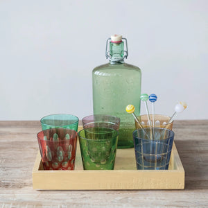 The CREATIVE COOP ETCHED GLASS WITH DESIGN, VARIOUS COLORS features six artisan pastel glasses, each with a unique etched pattern—ideal for those who love distinctive colored glassware.