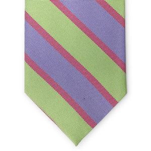 The PETER-BLAIR - BEAUFORT WOVEN SILK TIE IN GREEN by BIRD DOG BAY features diagonal green and lavender stripes separated by thin pink lines, shown rolled up on a white background.