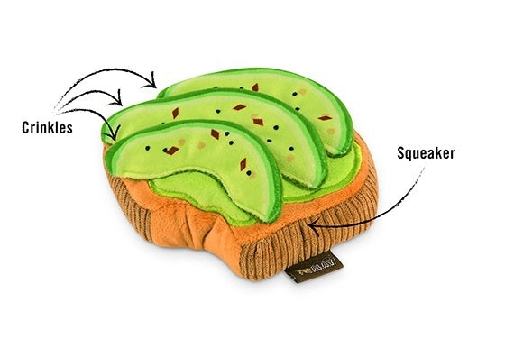 Introduce your pup to the BARKING BRUNCH - AVO-DOGGO TOAST by PLAY PET LIFESTYLES/BRANDS—a durable dog toy shaped like a slice of toast, topped with three avocado slices and decorated with embroidered seeds and seasoning. Perfect for playful pups who love dog brunch toys, it’s also machine washable for easy cleaning.