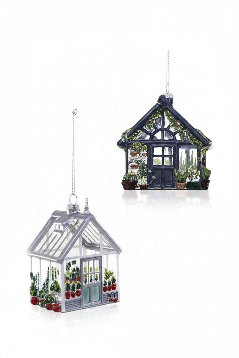 Two RECLAIMED GREENHOUSE ORNAMENT home decor pieces, one with a silver-toned frame and the other with a dark blue frame, both filled with miniature potted plants.
