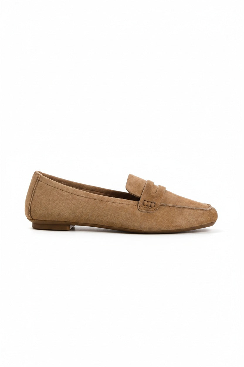 Top view of the REQINS - HEMA suede loafer in natural, featuring stitching details and a subtle branded leather insole, highlighting REQINS' craftsmanship against a plain white background.