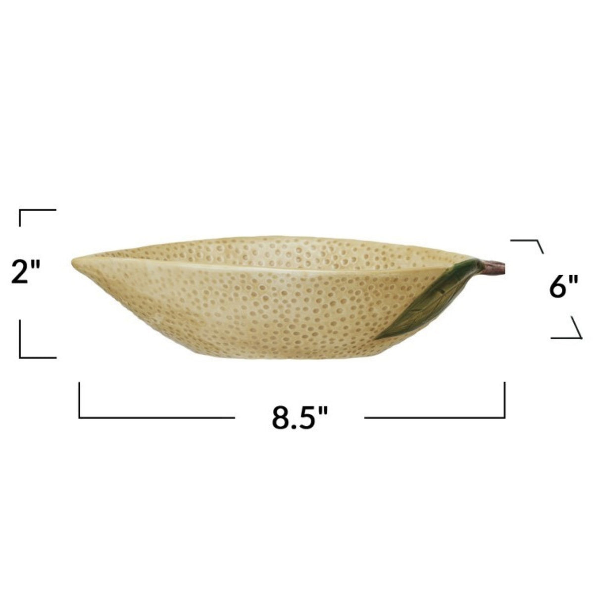 A flat lay features CREATIVE COOP’s HAND-PAINTED STONEWARE LEMON SHAPED BOWL, SMALL—one with oats, one with a grapefruit—plus a lemon-shaped pitcher and ceramic lemons atop a folded striped cloth. A delightful citrus-themed display.