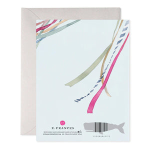 The E. FRANCES PAPER - WEDDING RIBBONS GREETING CARD features a lively watercolor painting with vibrant blue, pink, and green vertical ribbons, complemented by gold text that reads "On your beautiful wedding day." It comes with a beige envelope.