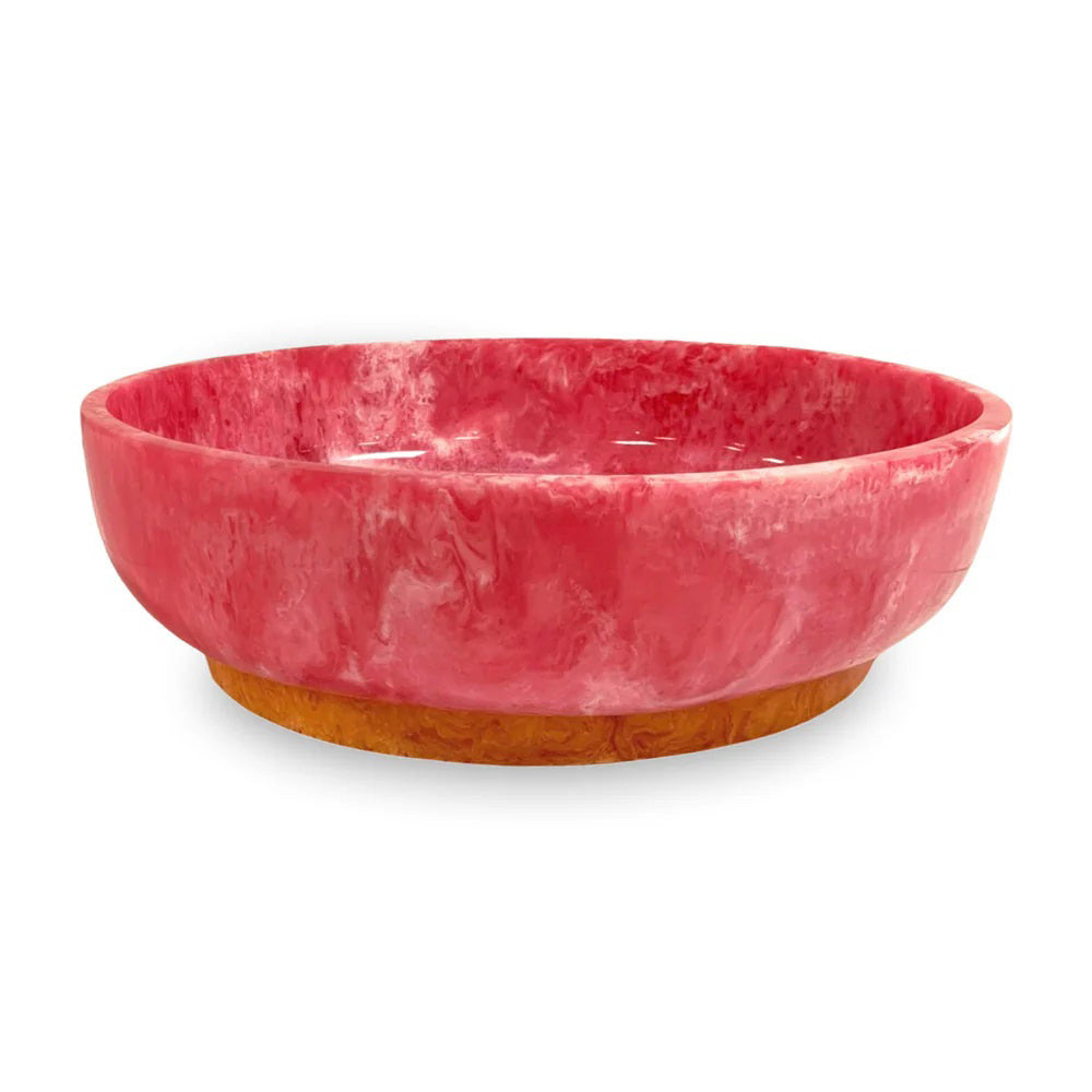 The BEATRIZ BALL RIO Oval Bowl with Base features a glossy, pink marbled finish and a contrasting tan base, displayed against a white background.