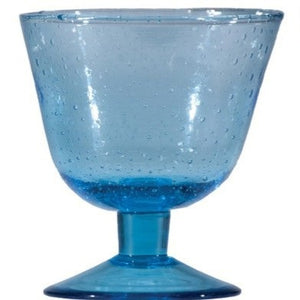 Four CREATIVE COOP HAND-BLOWN STEMMED SEEDED GLASSES in blue, amber, light green, and dark blue are displayed side by side on a white background, highlighting the charm of traditional glassmaking.