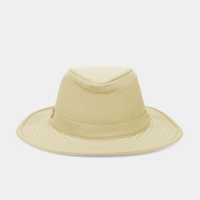 The TILLEY AIRFLO Broad Brim Hat LTM6 in Khaki Olive features mesh ventilation around the crown for outdoor use. Shown on a plain light background, this wide-brimmed sun protection hat is crafted by TILLEY.