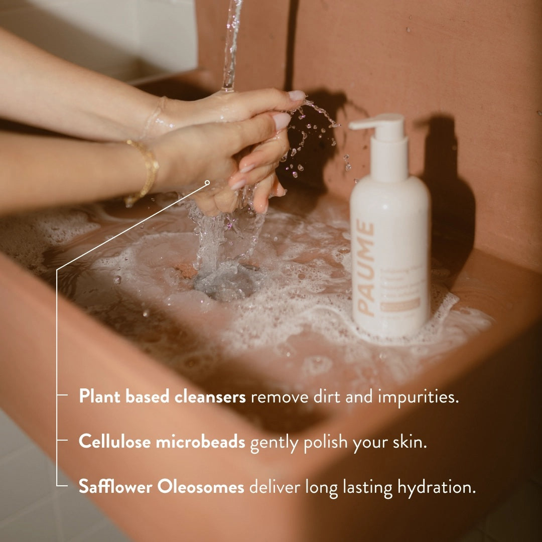 A bottle of PAUME - EXFOLITAING HAND SOAP, a moisturizing hand wash with pump, is displayed against a light beige background. The label shows tan and peach text with the product name and description.