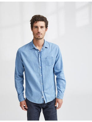The FRANK & EILEEN LUKE Men's Button Up Shirt in Famous Denim Classic Wash features light blue 100% cotton denim, a loose fit, straight hem, and rolled long sleeves. Displayed from the back against a white background.