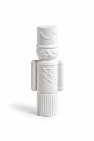 Small white ceramic DECORATIVE CERAMIC SOLDIER nutcracker figurine.