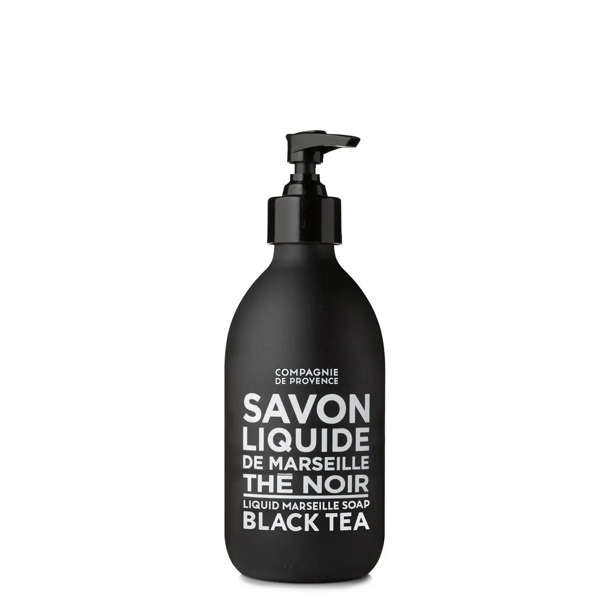 A black pump dispenser bottle labeled &quot;COMPAGNIE DE PROVENCE - SAVON LIQUIDE DE MARSEILLE BLACK TEA SOAP&quot; by CIE LUXE BRANDS, featuring sulphate-free liquid soap enriched with botanical oils in elegant white text.