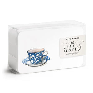 A clear plastic box contains 85 small notes, each featuring a watercolor illustration of a blue and white floral teacup on a saucer. The side label reads "E. Frances Paper - Spot of Tea Little Notes® use unsparingly.