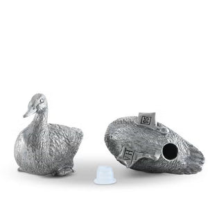 VAGABOND HOUSE's Pewter Duck Salt and Pepper Set showcases two ducks with detailed feather engravings, sitting slightly forward with dispensing holes on their backs.