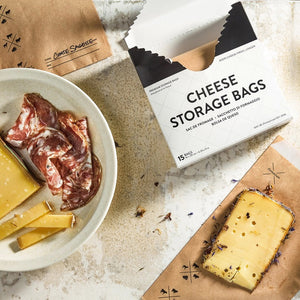 A white box labeled "FORMATICUM - CHEESE STORAGE BAGS" with cow, goat, and sheep icons. Includes 15 bags (6.25 x 11 in) for cheese storage at home; info available in multiple languages.