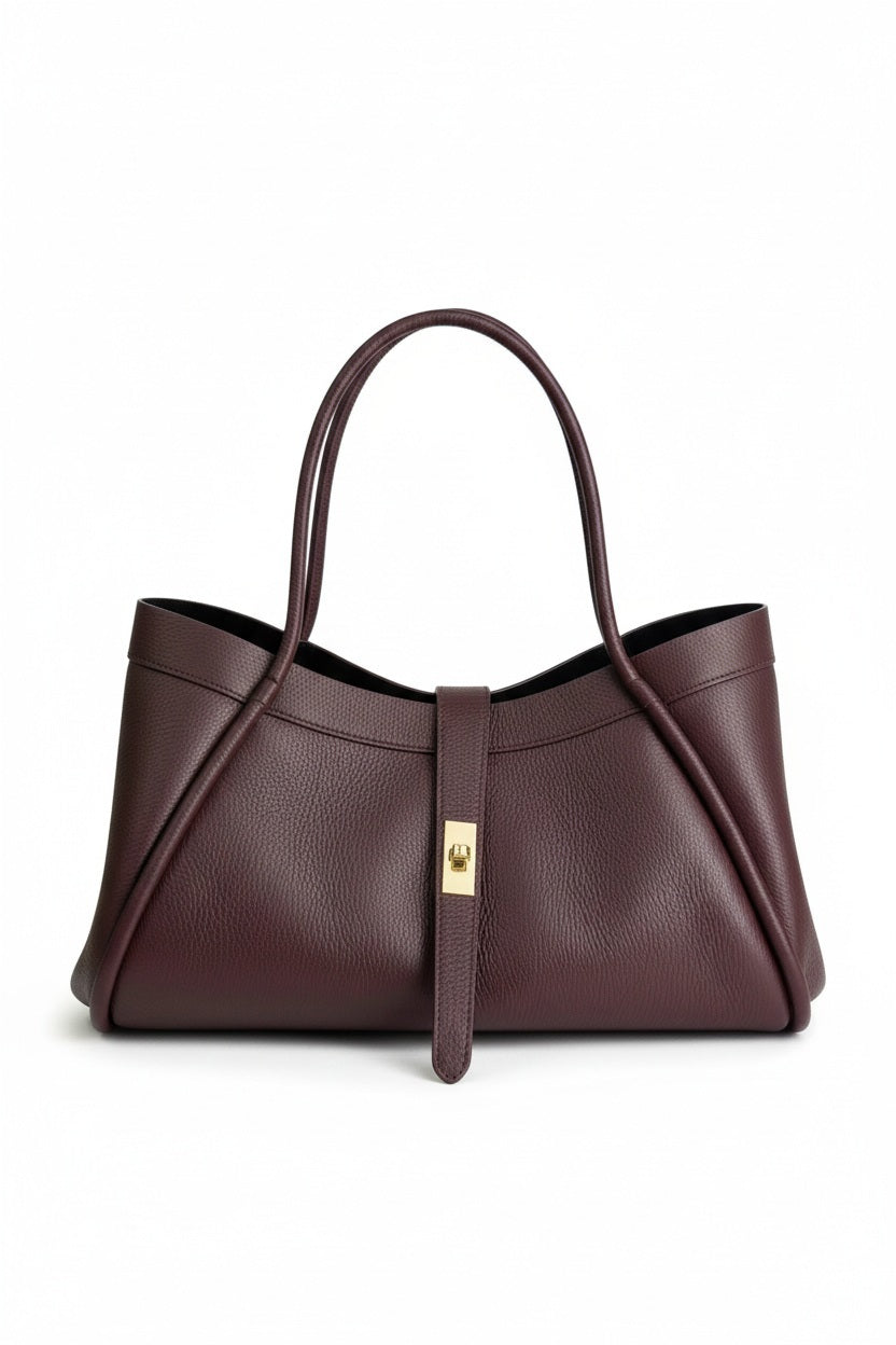 Structured deep burgundy suede THE PORTICO LEATHER HANDBAG IN BORDEAUX tote bag with two top handles and a central strap featuring a gold-tone clasp.
