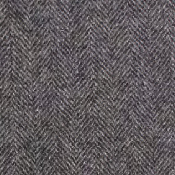 An olive herringbone wool baseball cap by WIGENS, inspired by Italian textile heritage, featuring a curved brim and a small metal tag on the side, displayed against a white background.