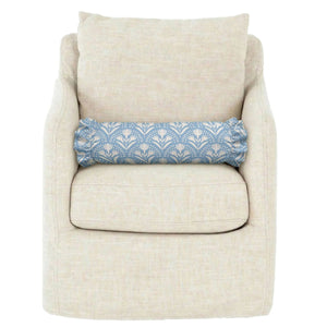 The LOOM AND CLOTH - SERENA RUFFLED BOLSTER PILLOW by LOOM & CLOTH features a cylindrical silhouette with ruffled ends, upholstered in light blue fabric adorned with a white floral pattern, bringing timeless elegance and vintage-chic style to your decor.