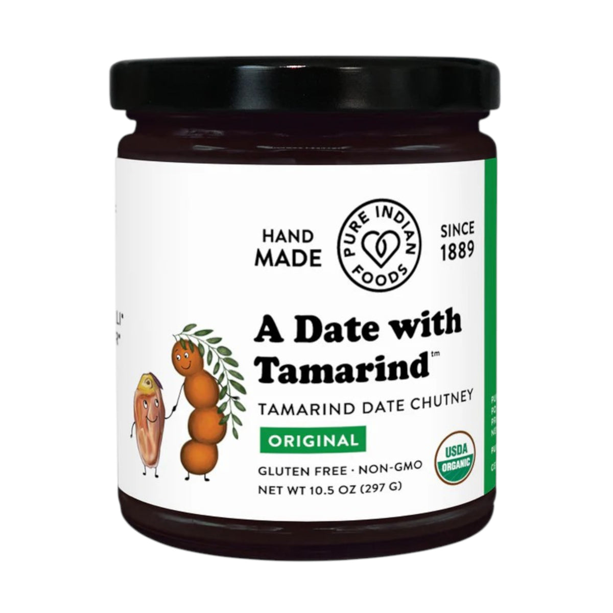 A jar of PURE INDIAN FOODS- A DATE WITH TAMARIND chutney sits beside toasted bread, as a spoon drizzles this authentic Indian tamarind-date condiment over toast on a wooden board.