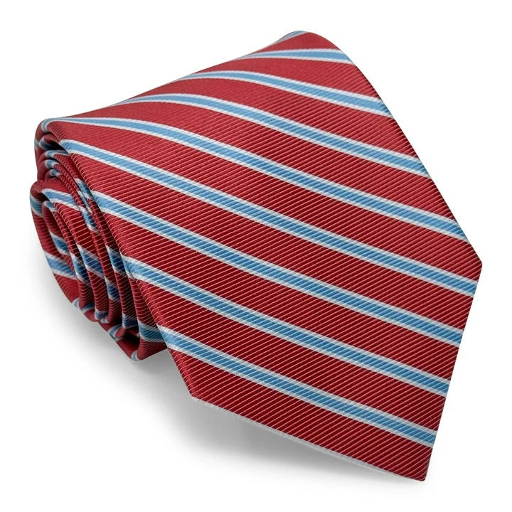 The COLLARED GREENS - WHITMAN TIE IN CORAL AND LIGHT BLUE by BIRD DOG BAY is a rolled-up coral necktie featuring diagonal light blue and white stripes, displayed on a white background. Crafted from premium materials, this versatile striped tie elevates any outfit with a touch of sophistication.