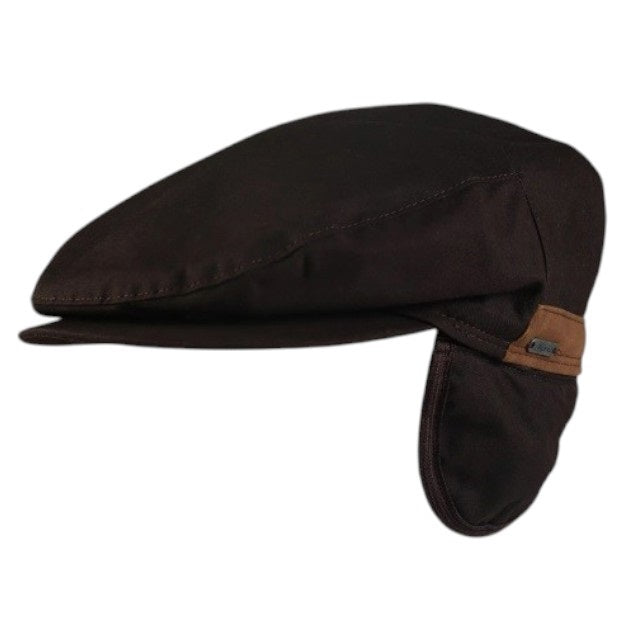 The WIGENS IVY Waxed Cotton Vintage Cap with Fleece Lining in Dark Brown is a water-repellent flat cap crafted from dark brown waxed cotton. It features fold-down earflaps and a small tan accent on the side. The cap is displayed from a side angle against a plain white background.