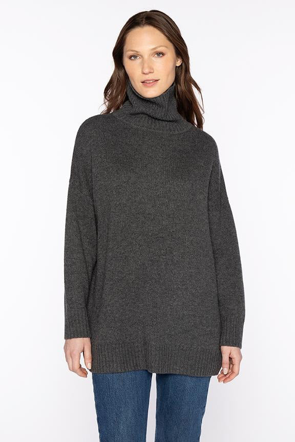 The KINROSS CASHMERE oversized cozy mock neck sweater features long sleeves with ribbed cuffs, hem, and collar in beige cashmere, shown on a white background.