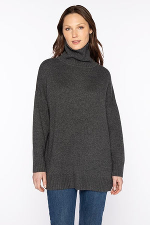 The KINROSS CASHMERE oversized cozy mock neck sweater features long sleeves with ribbed cuffs, hem, and collar in beige cashmere, shown on a white background.