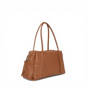 OLIVEVE Solara Satchel in caramel Italian buffalo cowhide leather with long shoulder straps and a top zipper closure.