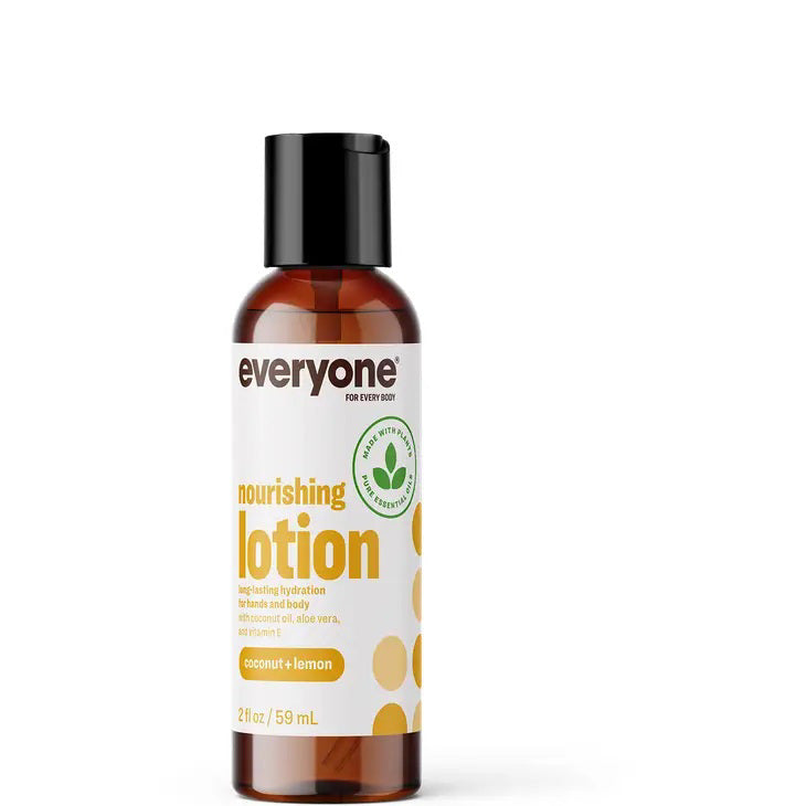 A 2 fl oz bottle of Everyone for Everybody Coconut &amp; Lemon Travel Size Lotion is shown against a white background. This travel-size moisturizing lotion is designed for hands and body. The brown bottle with a black cap features white and yellow labeling.