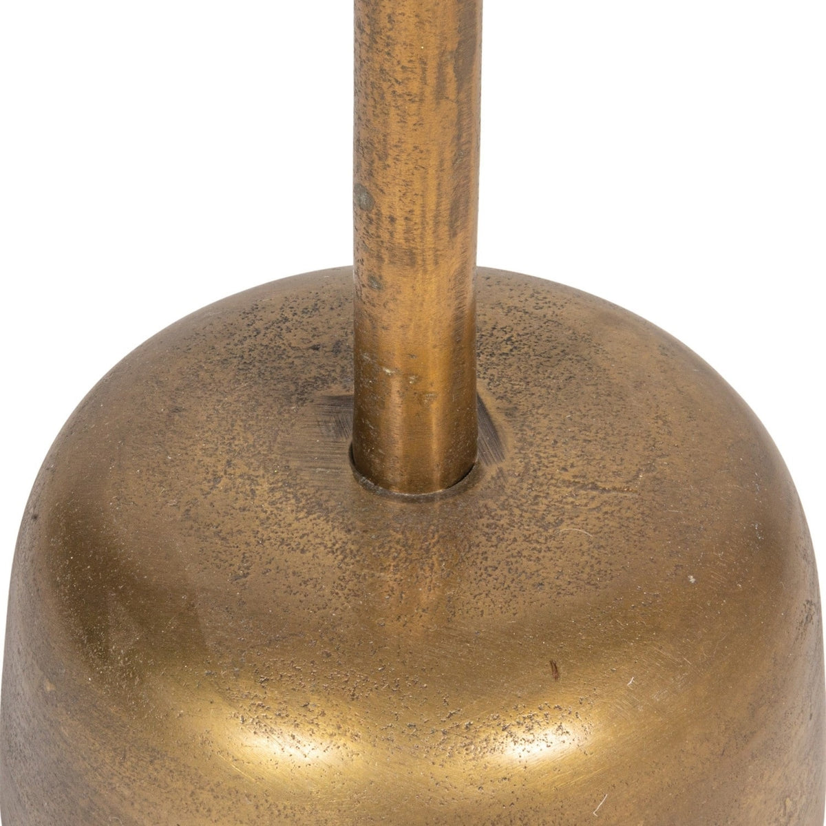 The CREATIVE COOP ALUMINUM SIDE TABLE WITH ANTIQUE BRASS FINISH is a small, round piece showcasing a wide, shallow top, slender central stem, and rounded base. Set against a plain white background, this modern minimalist table features an elegant aluminum construction with an antique brass finish.
