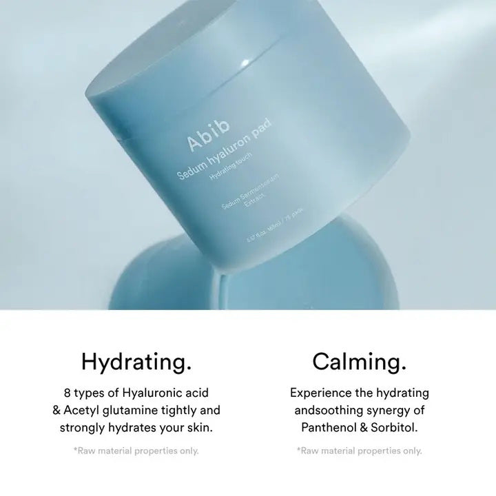 A light blue cylindrical container labeled &quot;SEDUM HYALURON PAD HYDRATING TOUCH&quot; by ASIAN BEAUTY WHOLESALE, featuring Sedum Sarmentosum Extract, hyaluronic acid, and containing 60 hydrating toning pads.