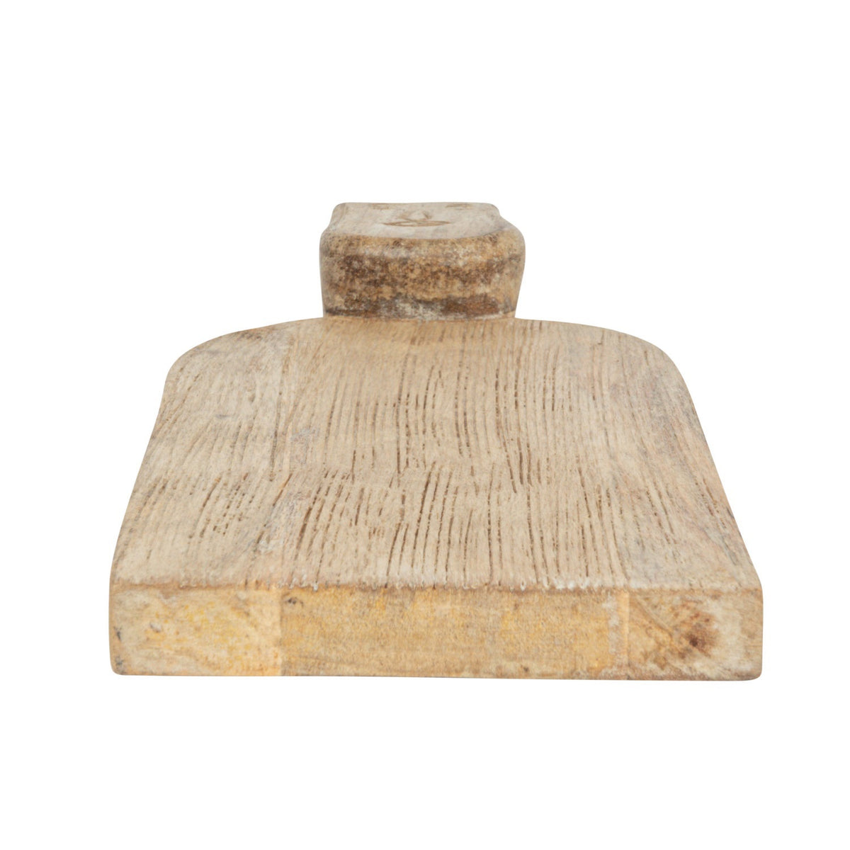 The CREATIVE COOP HAND-CARVED MANGO WOOD CHARCUTERIE/CUTTING BOARD WITH FACE HANDLE features a flat, rectangular shape, rounded edges, and rustic grain patterns for a handcrafted look.