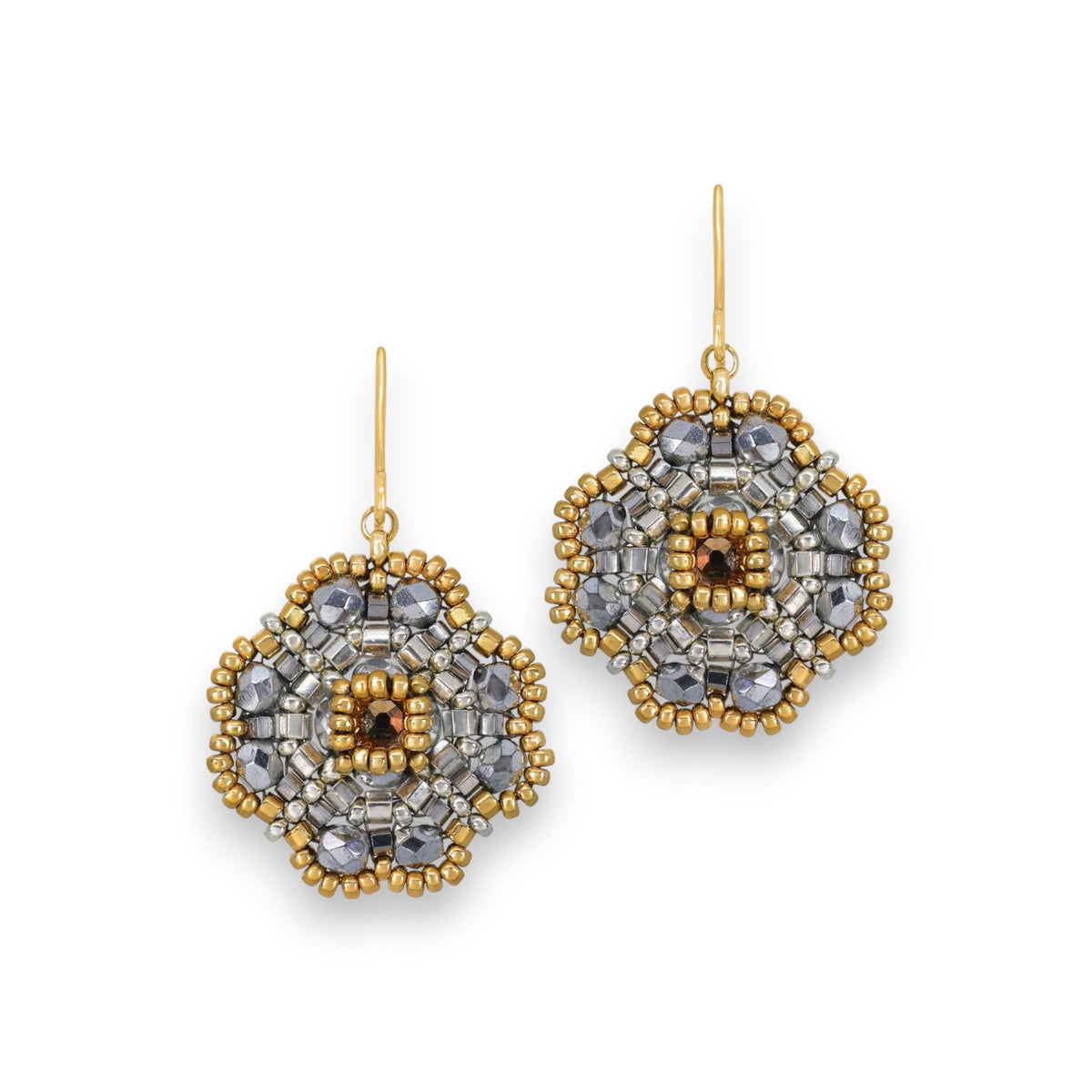 The MIGUEL ASES - MIYUKE CRYSTAL BEAD PYRITE EARRINGS by MIGUEL ASES, INC. showcase a geometrically artistic floral design with Miyuki crystal beading and a central gold bead, suspended from gold hooks and highlighted with subtle silver accents.