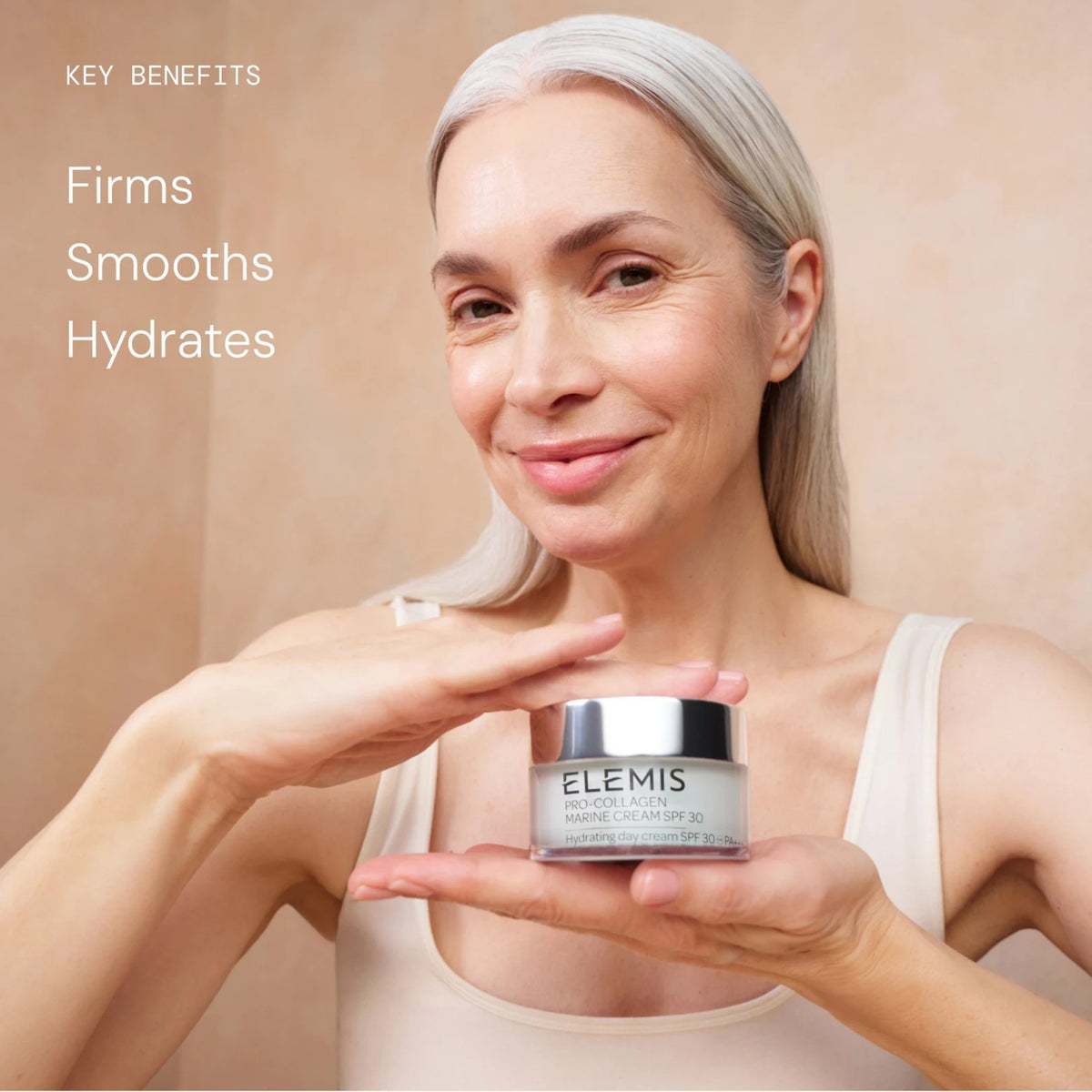 An open jar of ELEMIS - PRO-COLLAGEN MARINE CREAM SPF30 100ML by ELEMIS - STEINER sits on a bathroom counter, with text highlighting its anti-aging and hydrating benefits, and clinical trial results displayed at the bottom.