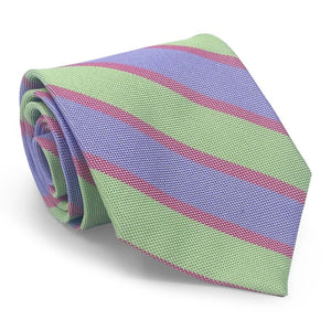 Close-up of the BIRD DOG BAY PETER-BLAIR Beaufort woven silk tie in green, featuring diagonal lavender stripes with thin red accents and a textured, handmade-in-New-York look.