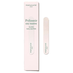 The MANUCURIST - GLASS BUFFER by MANUCURIST INC, shown alongside its rectangular light pink box with green text, is a recyclable premium nail buffer that delivers a flawless, polished-free shine.