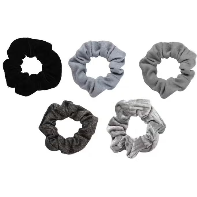 A set of five velvet hair scrunchies in stylish black and gray shades, displayed on a card labeled "KITSCH - VELVET SCRUNCHIES" by KITSCH.