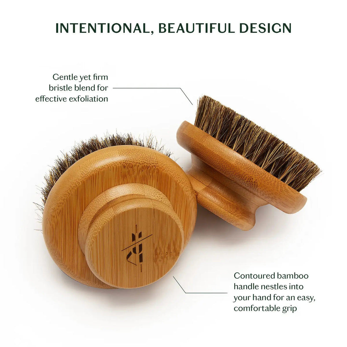 The KATE MCLEOD - THE DRY BRUSH, featuring natural bristles, is displayed on a beige towel atop marble, accented with an orange flower—evoking a relaxing dry brushing and lymphatic drainage ritual.