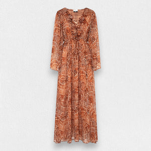 The SFIZIO - RUST PRINT RUFFLED DRESS by SFIZIO is a long, full-sleeved, flowy dress made in Italy, featuring a brown and beige spiral pattern. It boasts a V-neckline, ruffled detailing on the bodice, and an elastic waistband. Crafted from lightweight viscose creponne, it’s perfect for warm weather.