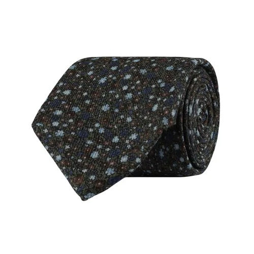 An AMANDA CHRISTENSEN FLORAL WOOL TIE IN OLIVE MELANGE, rolled up and displayed on a plain white background—this sophisticated accessory features an elegant floral design, making it a refined addition to any men’s collection and perfect for pairing with tailored suits.