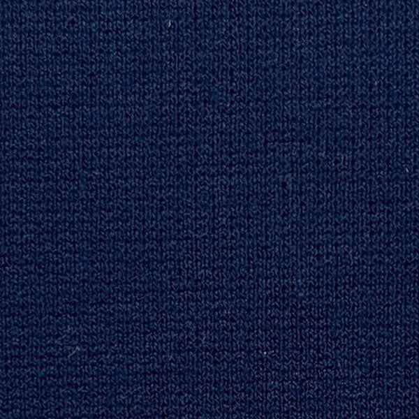 Close-up of the MEIMEIJ - PULL ON LEGGING PANT by MEIMEIJ, featuring a dark blue, tightly woven fabric with a slightly textured surface and uniform finish—ideal for ankle-length stretch leggings.