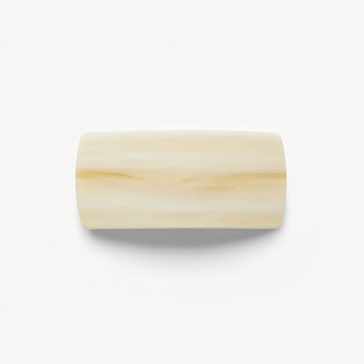 The MACHETE Jumbo Box Barrette in Alabaster, by MACHETE, is a rectangular ivory-hued hair accessory with smooth edges, shown on a plain white background.