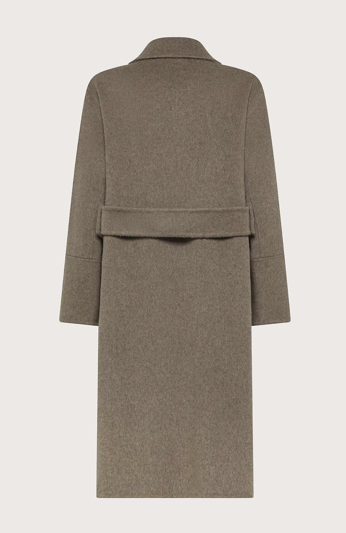 A woman poses confidently with one hand in her pocket, wearing the SEVENTY VENEZIA - WOOL BLEND LONG COAT by SEVENTY over a striped shirt, brown trousers, and brown shoes against a plain background.