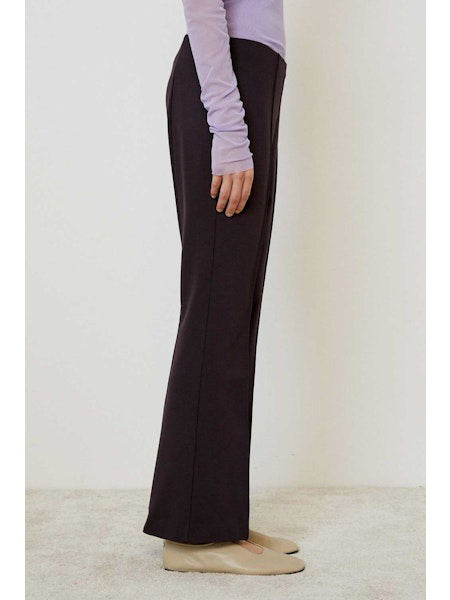 A close-up of MEIMEIJ&#39;s plain, dark brown fabric with a smooth, even texture—ideal for MEIMEIJ - PULL ON PANTS.