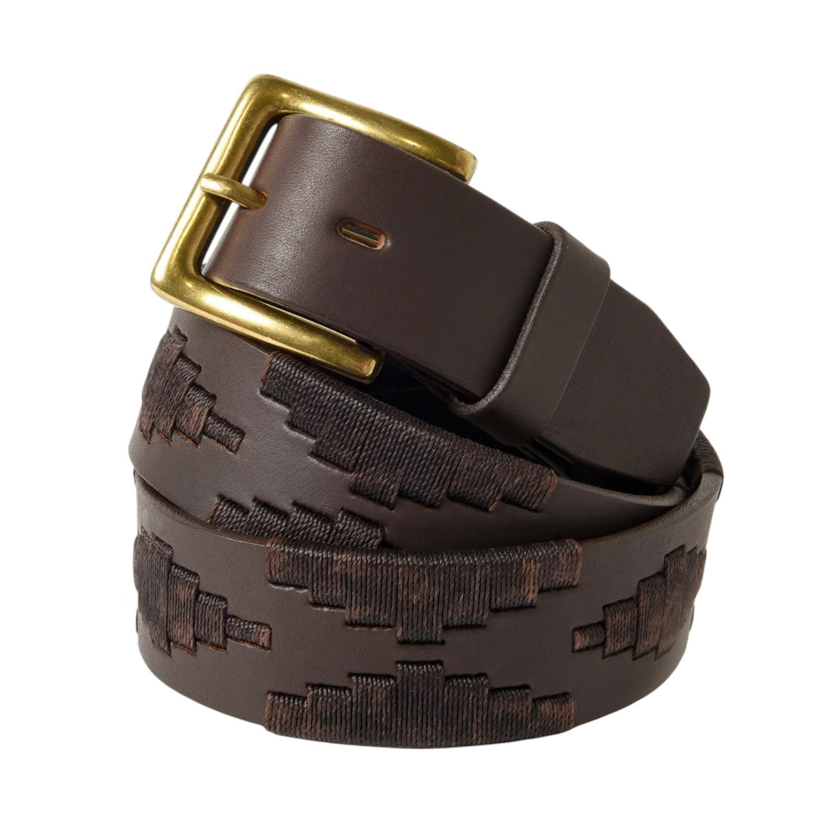 The LA MATERA - CASTANO POLO BELT by LA MATERA, featuring a dark brown leather embossed geometric design and brass buckle, is handcrafted in Argentina and coiled neatly against a plain white background.