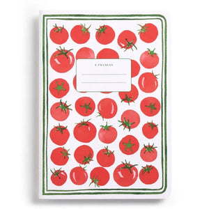 The E. FRANCES PAPER STITCHED NOTEBOOKS GARDENER, SET OF 2, featuring a green and white checkered cover, is open on a white surface next to two striped pencils—one green and one pink—with the right page blank.