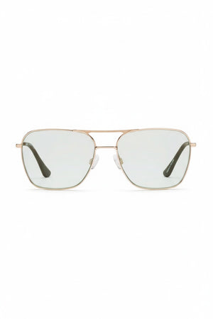 The CADDIS - HOOPER READERS feature square aviator-style frames made from lightweight gold metal, paired with scratch-resistant green-tinted lenses. Clear nose pads ensure comfortable wear, while the dark-finished arms elegantly contrast against a plain white backdrop.