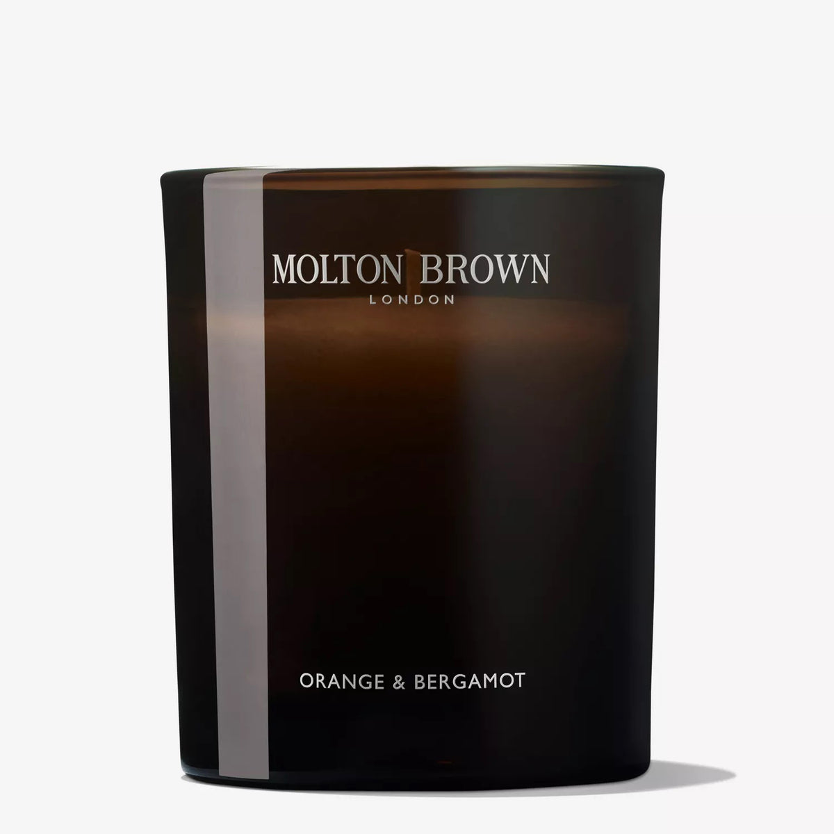 A dark brown glass single wick jar candle labeled &quot;MOLTON BROWN - ORANGE AND BERGAMOT CANDLE,&quot; featuring a vibrant citrus scent, displayed against a plain white background.