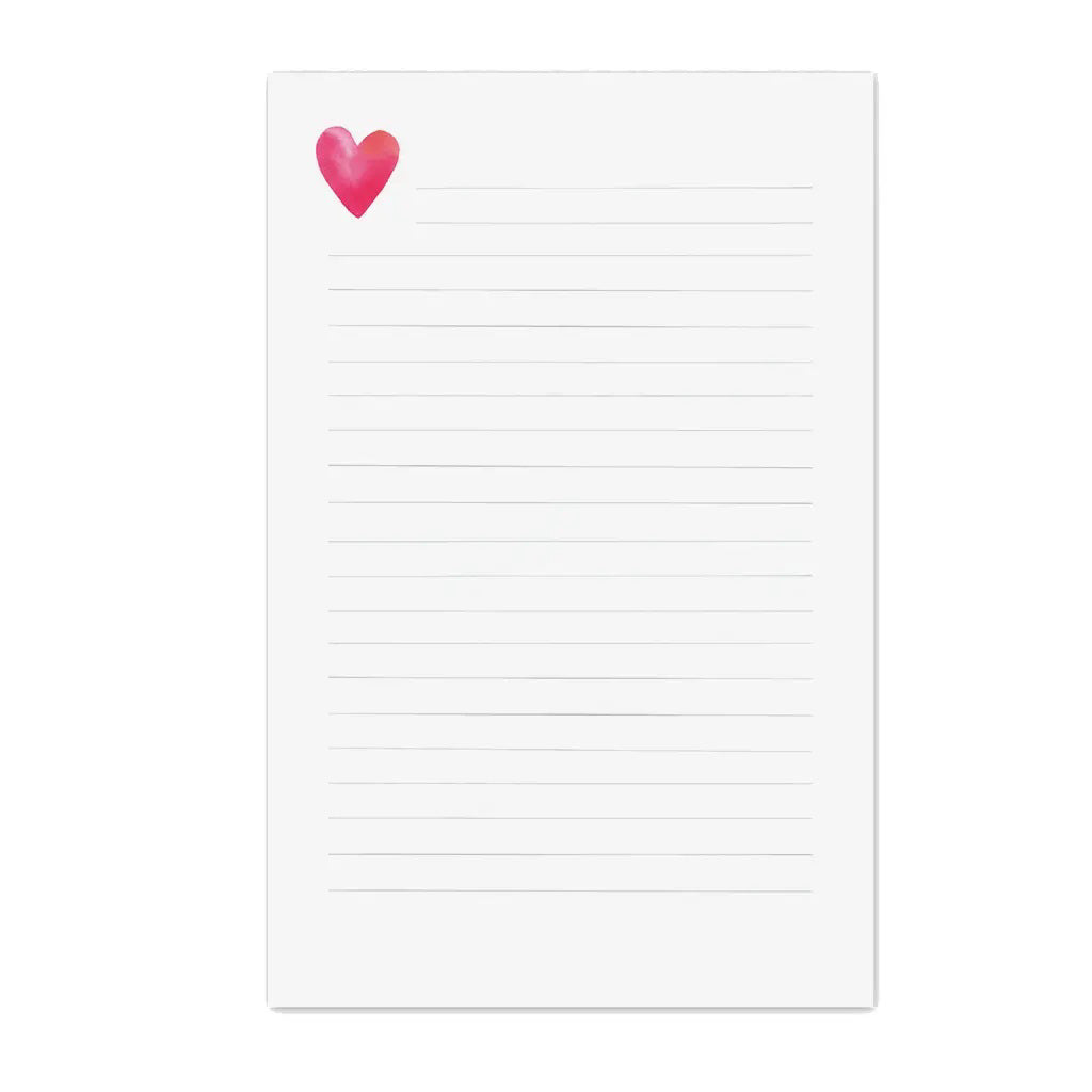 The E. Frances Paper Heart Lined Notepad boasts a charming pink and red heart illustration in the top left corner, reflecting the brand's commitment to quality products that blend style with functionality.